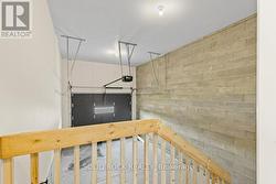Garage interior with railing/auto gar dr opener -