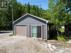 Garage + Bunkie w/additional double garage at side -
