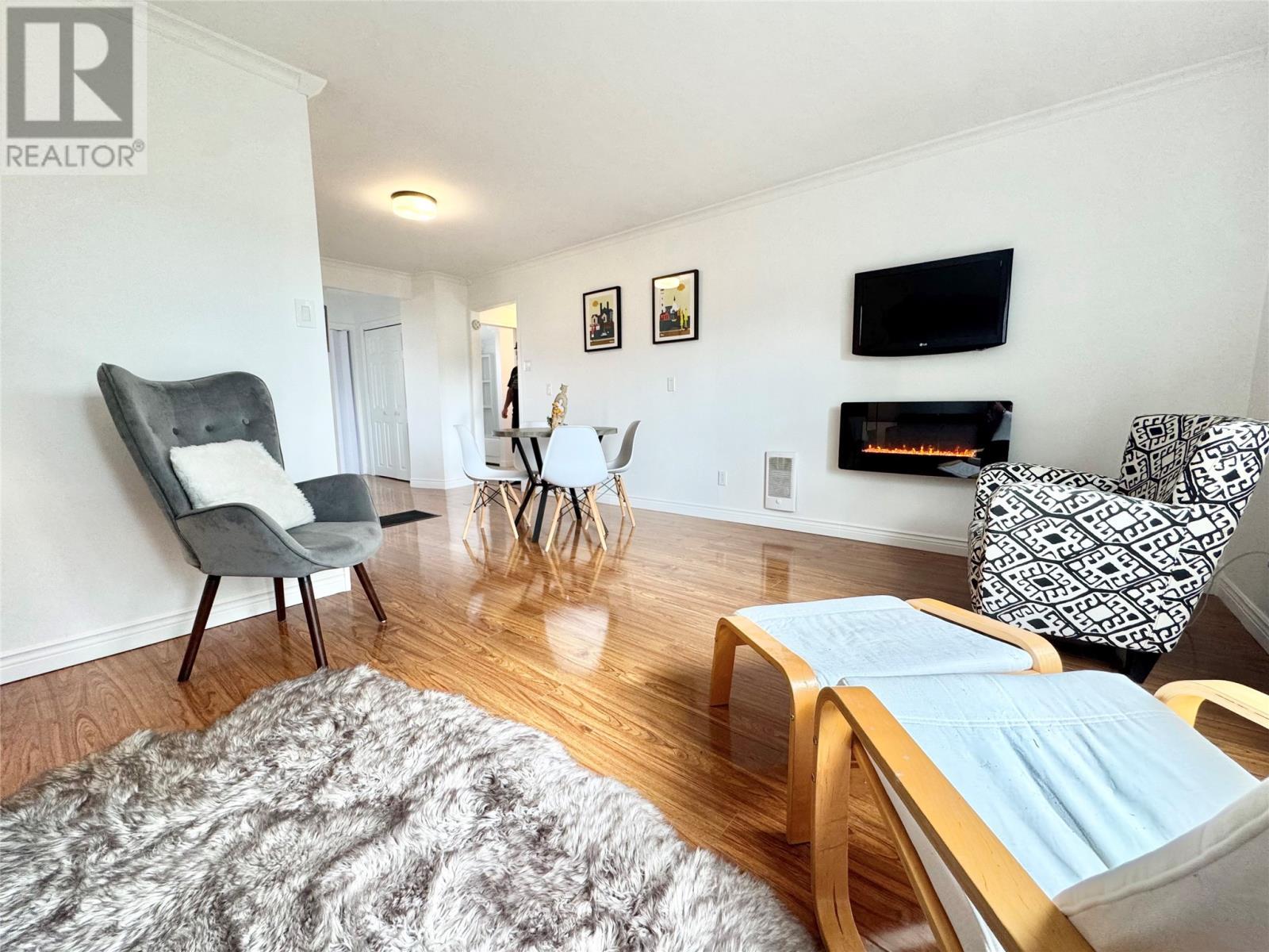 7 Dyke'S Lane, Musgrave Harbour, NL - Indoor Photo Showing Living Room With Fireplace