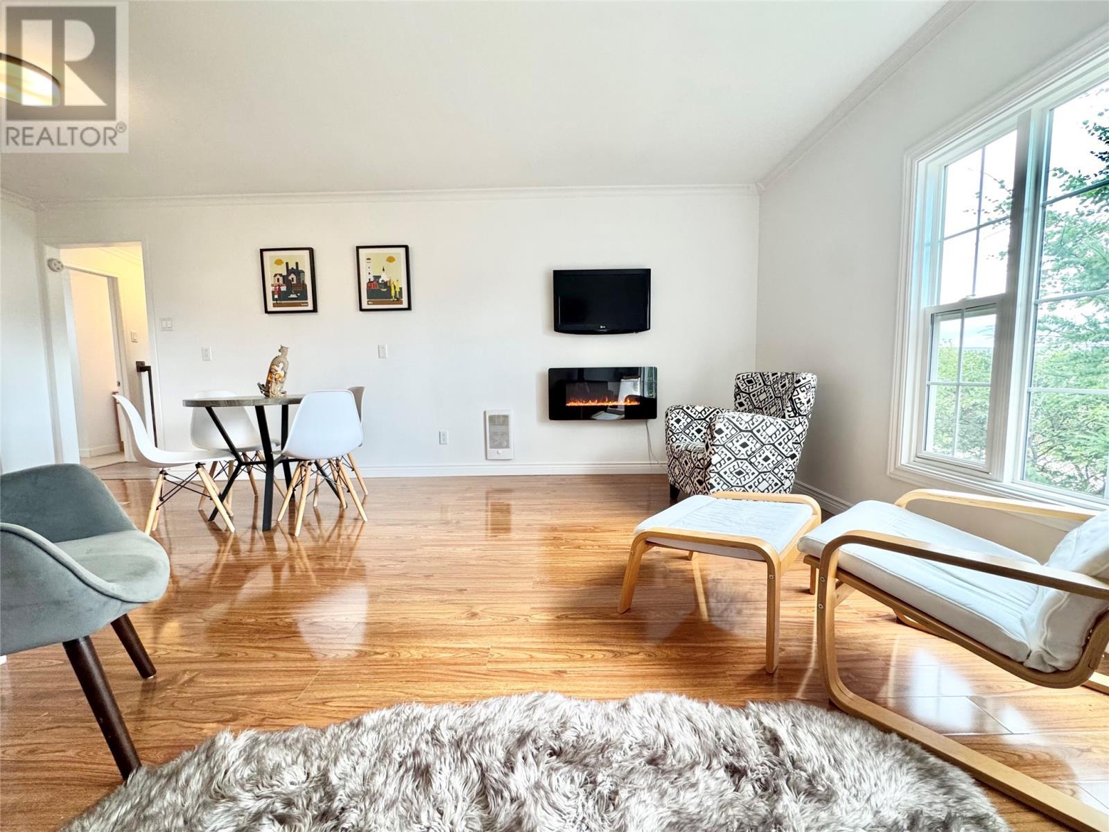 7 Dyke'S Lane, Musgrave Harbour, NL - Indoor Photo Showing Living Room With Fireplace