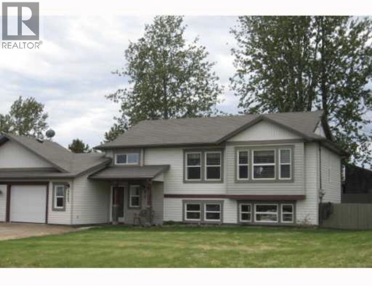 B 4609 Boundary Road, Fort Nelson, BC - Outdoor With Facade