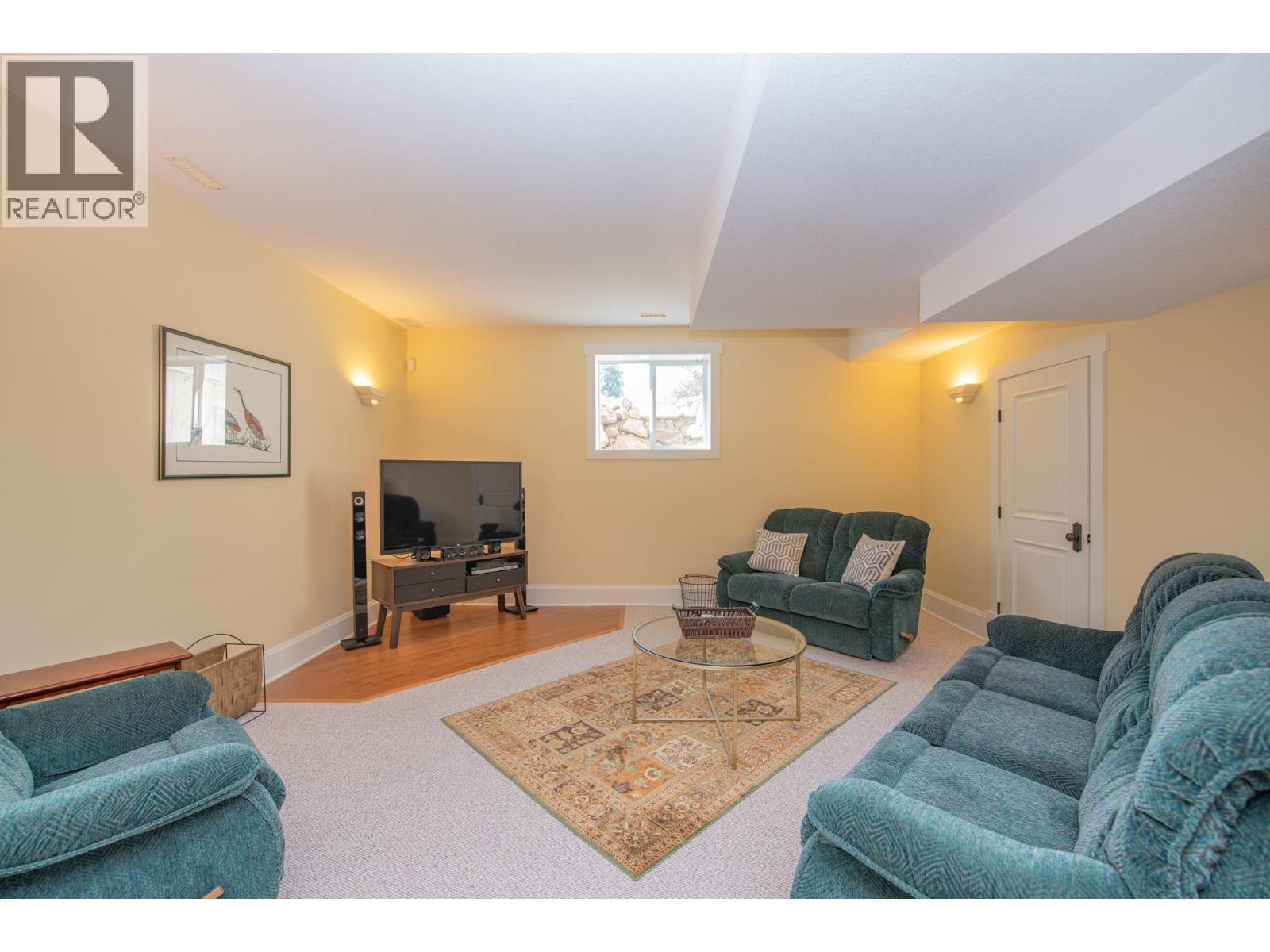 Family room - basement - 8163 Old Kamloops Road, Vernon, BC - Indoor Photo Showing Living Room