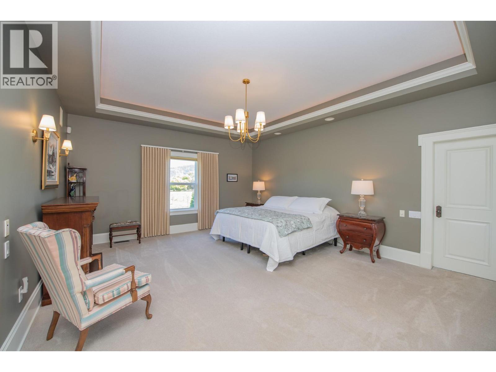 Master Suite - main floor - 8163 Old Kamloops Road, Vernon, BC - Indoor Photo Showing Bedroom