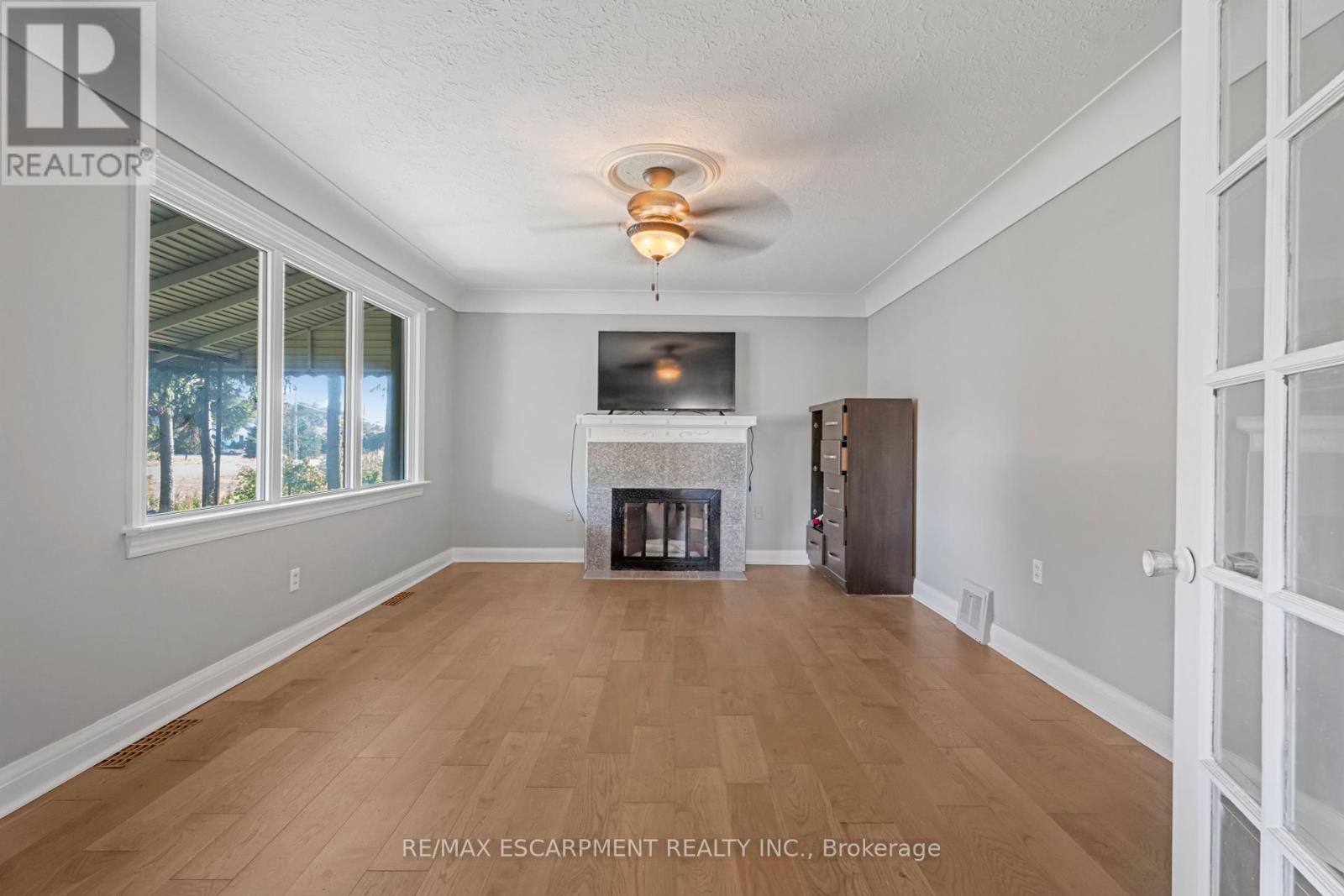 2865 Highway 3, Norfolk, ON - Indoor With Fireplace