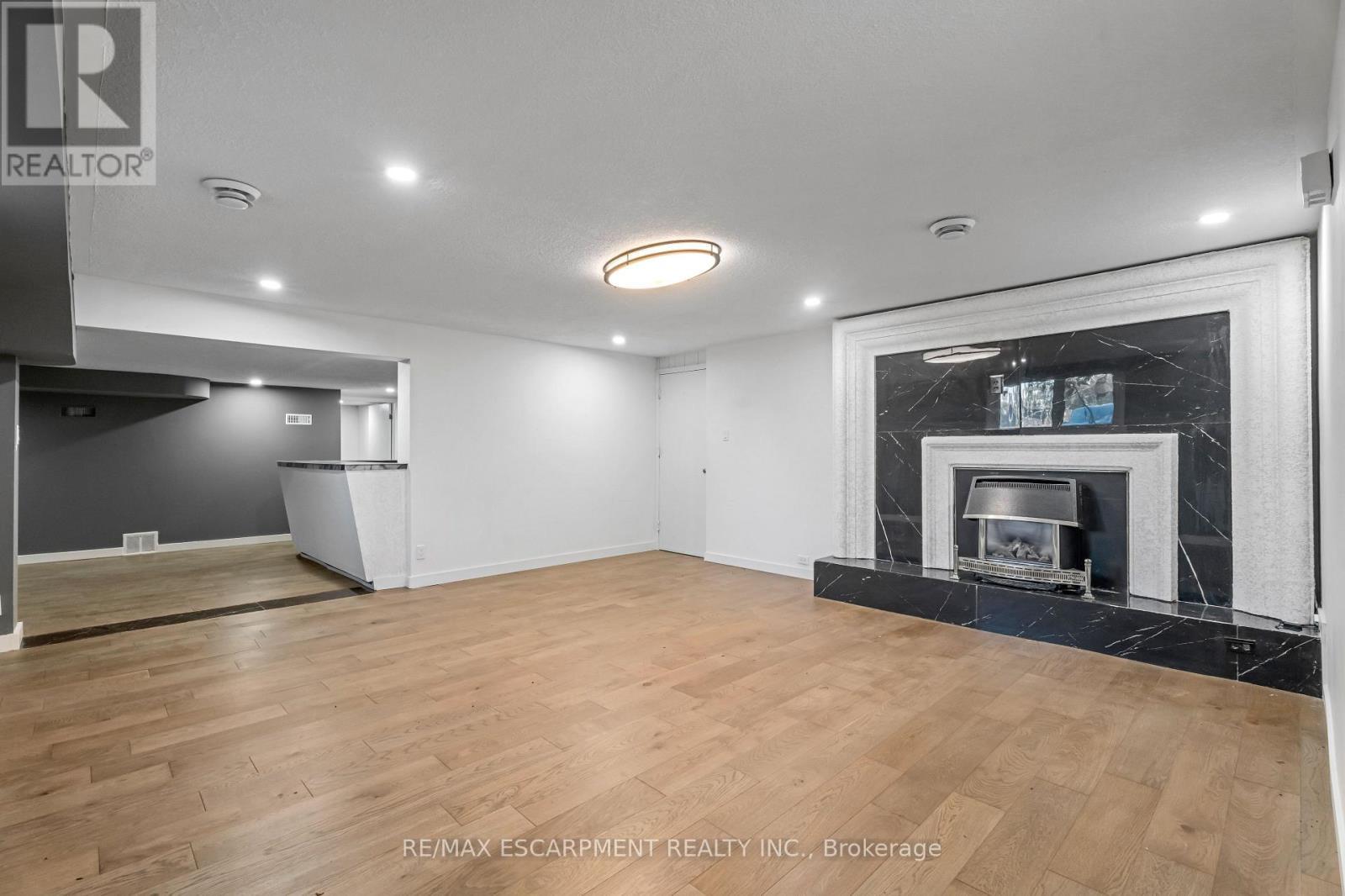 2865 Highway 3, Norfolk, ON - Indoor Photo Showing Living Room With Fireplace