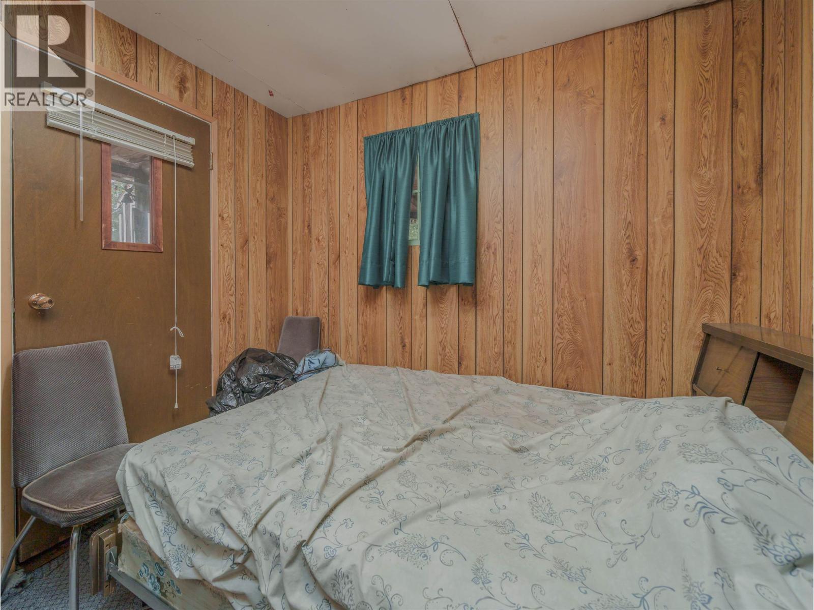 920 S Green Lake Road, 100 Mile House, BC - Indoor Photo Showing Bedroom