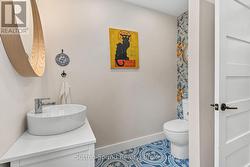 Main floor laundry/2pc bathroom. -