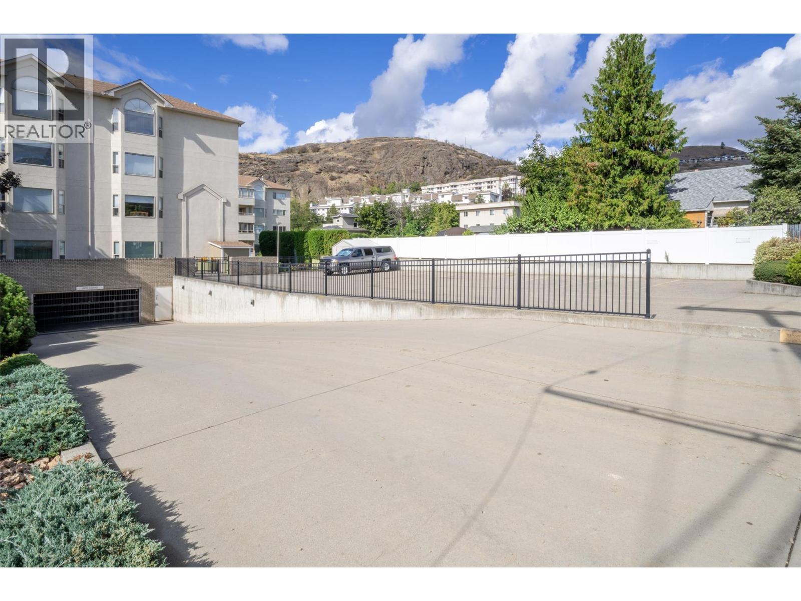 Entrance to parkade and visitor parking - 3805 30 Avenue Unit# 112, Vernon, BC - Outdoor