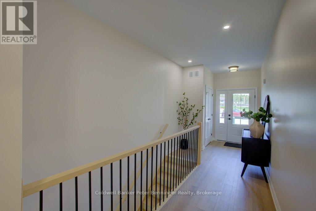 Open stair well to basement with wide hall - 2 - 305 Arnaud Street, Arran-Elderslie, ON - Indoor Photo Showing Other Room