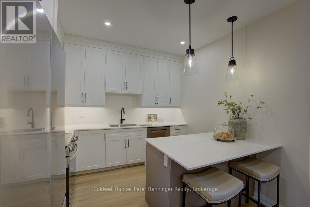 Quartz Counter tops (pic from staged unit 4) - 2 - 305 Arnaud Street, Arran-Elderslie, ON - Indoor Photo Showing Kitchen