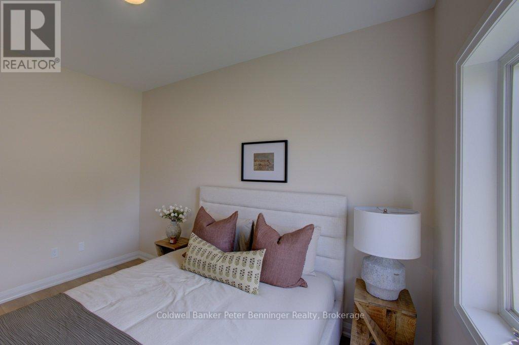 Room for a dresser (pic from staged unit 4) - 2 - 305 Arnaud Street, Arran-Elderslie, ON - Indoor Photo Showing Bedroom