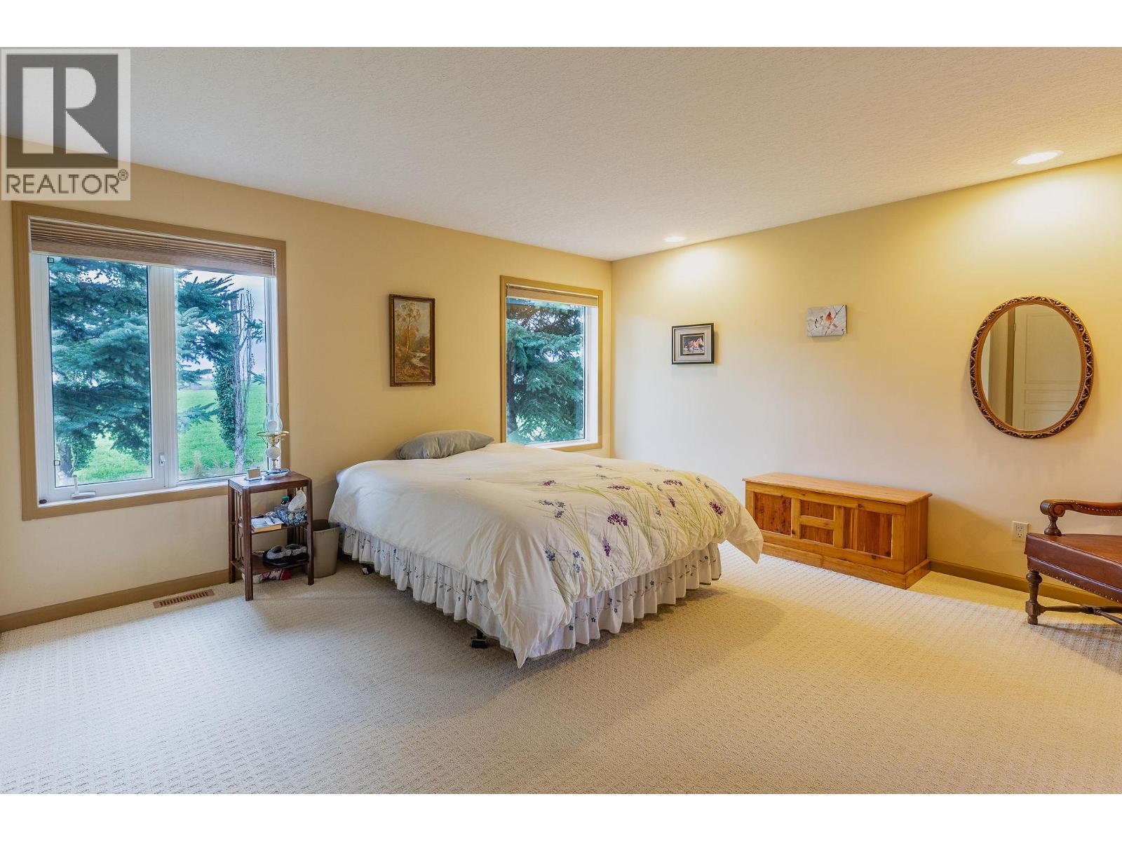 Primary Bedroom - 710 Indian Road, Creston, BC - Indoor Photo Showing Bedroom
