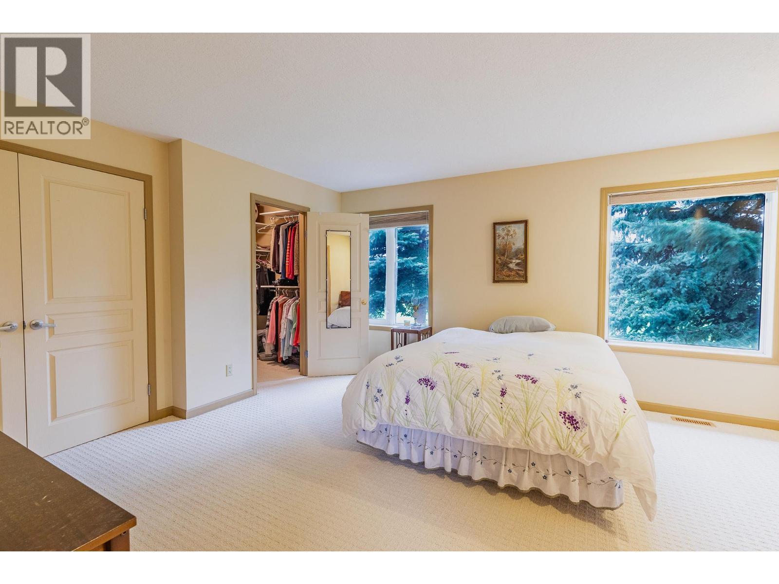Primary Bedroom - 710 Indian Road, Creston, BC - Indoor Photo Showing Bedroom
