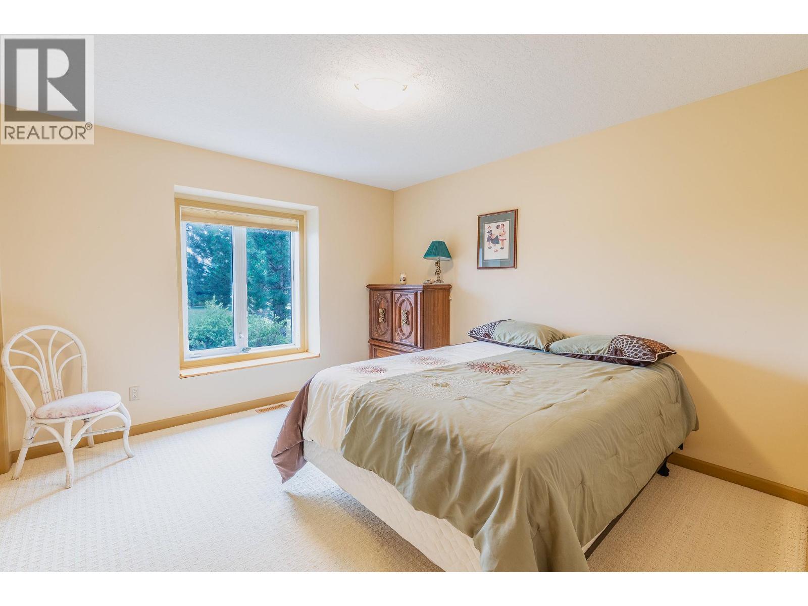 Bedroom - 710 Indian Road, Creston, BC - Indoor Photo Showing Bedroom