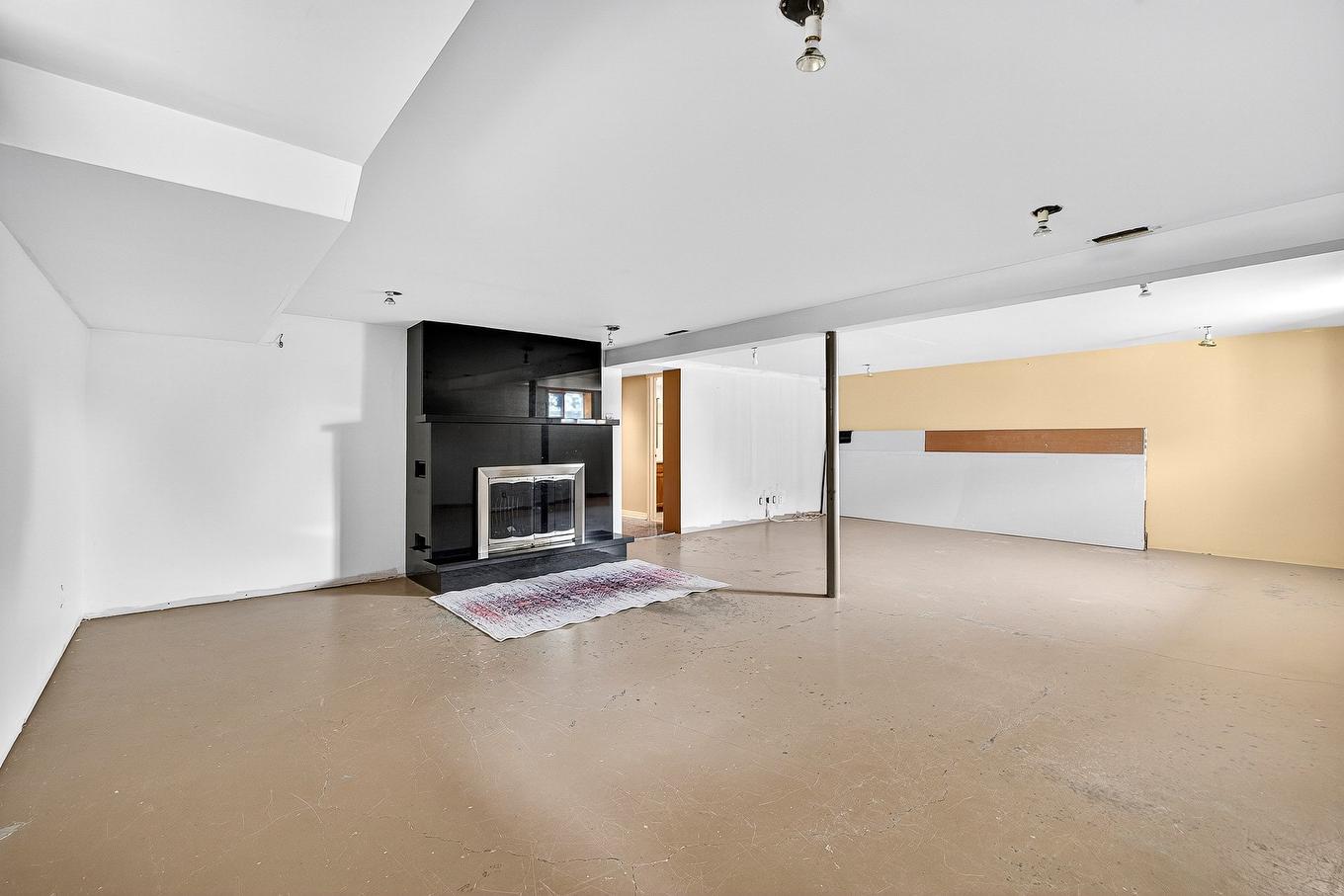 Basement - 59 Rue Frontenac, Shawville, QC - Indoor With Fireplace