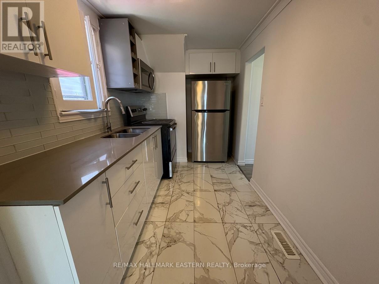 581 Paterson Street, Peterborough Central (South), ON - Indoor Photo Showing Kitchen With Double Sink