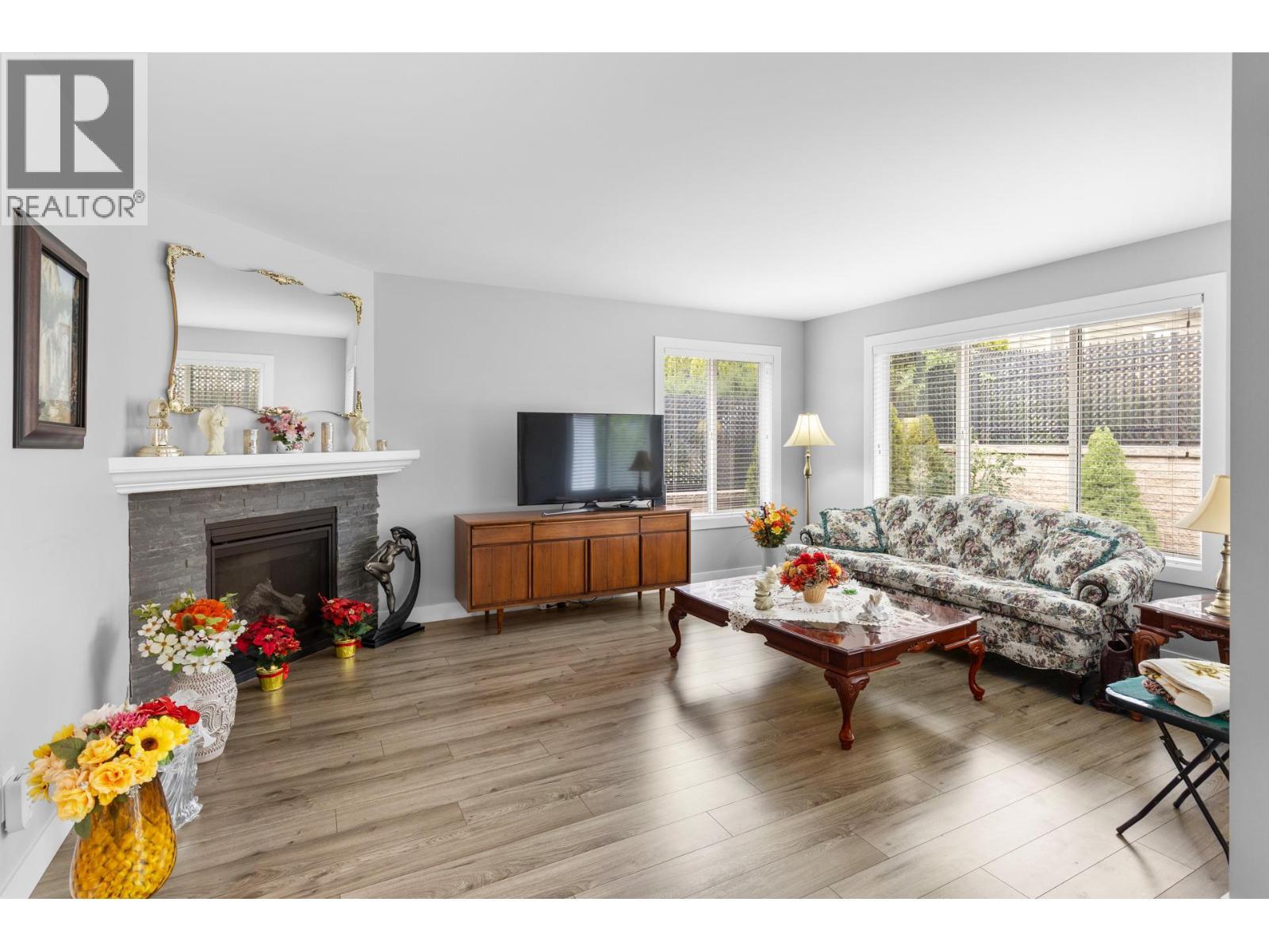 2067 Mallard Drive, Westbank, BC - Indoor Photo Showing Living Room With Fireplace