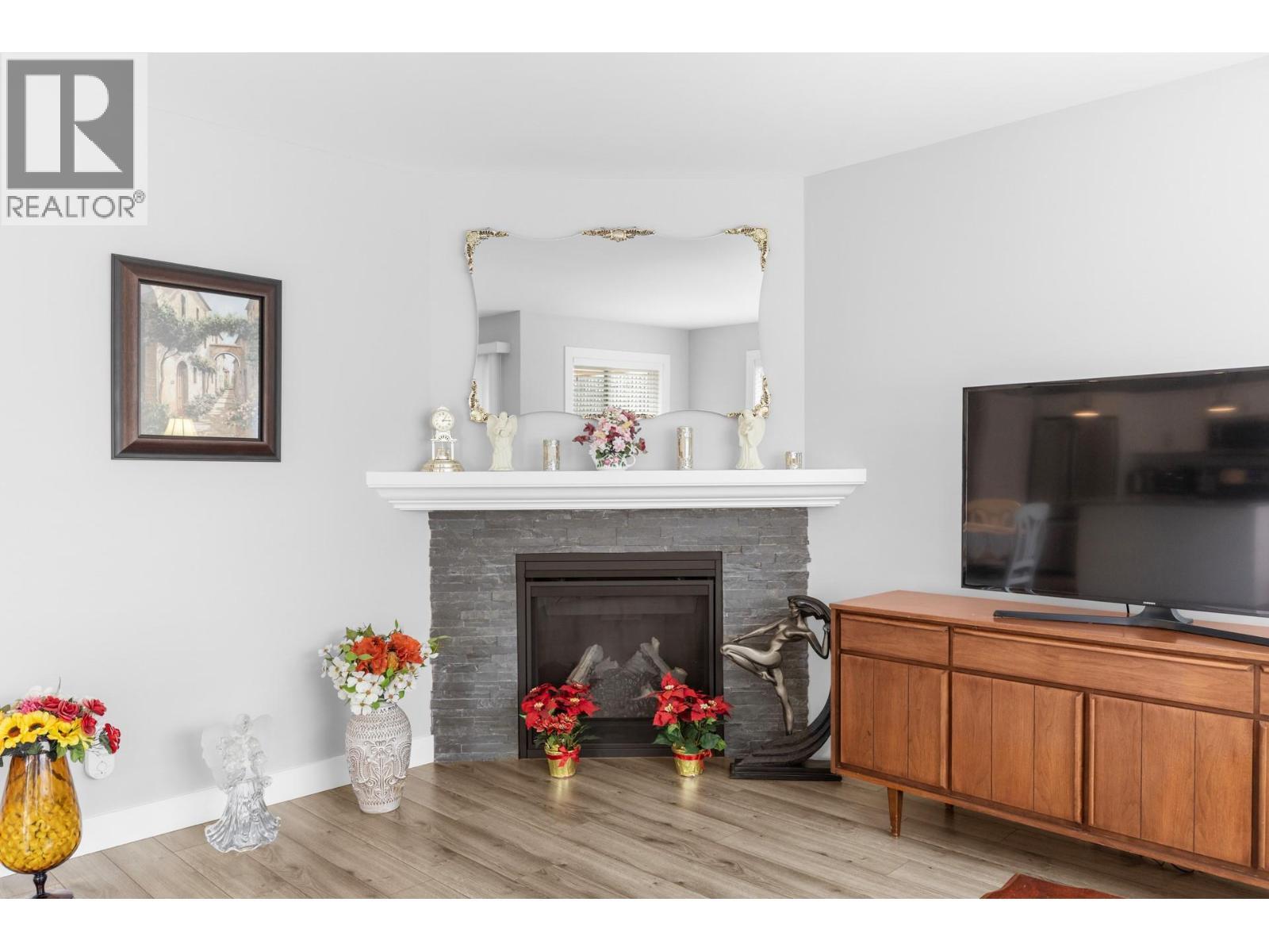 2067 Mallard Drive, Westbank, BC - Indoor Photo Showing Living Room With Fireplace