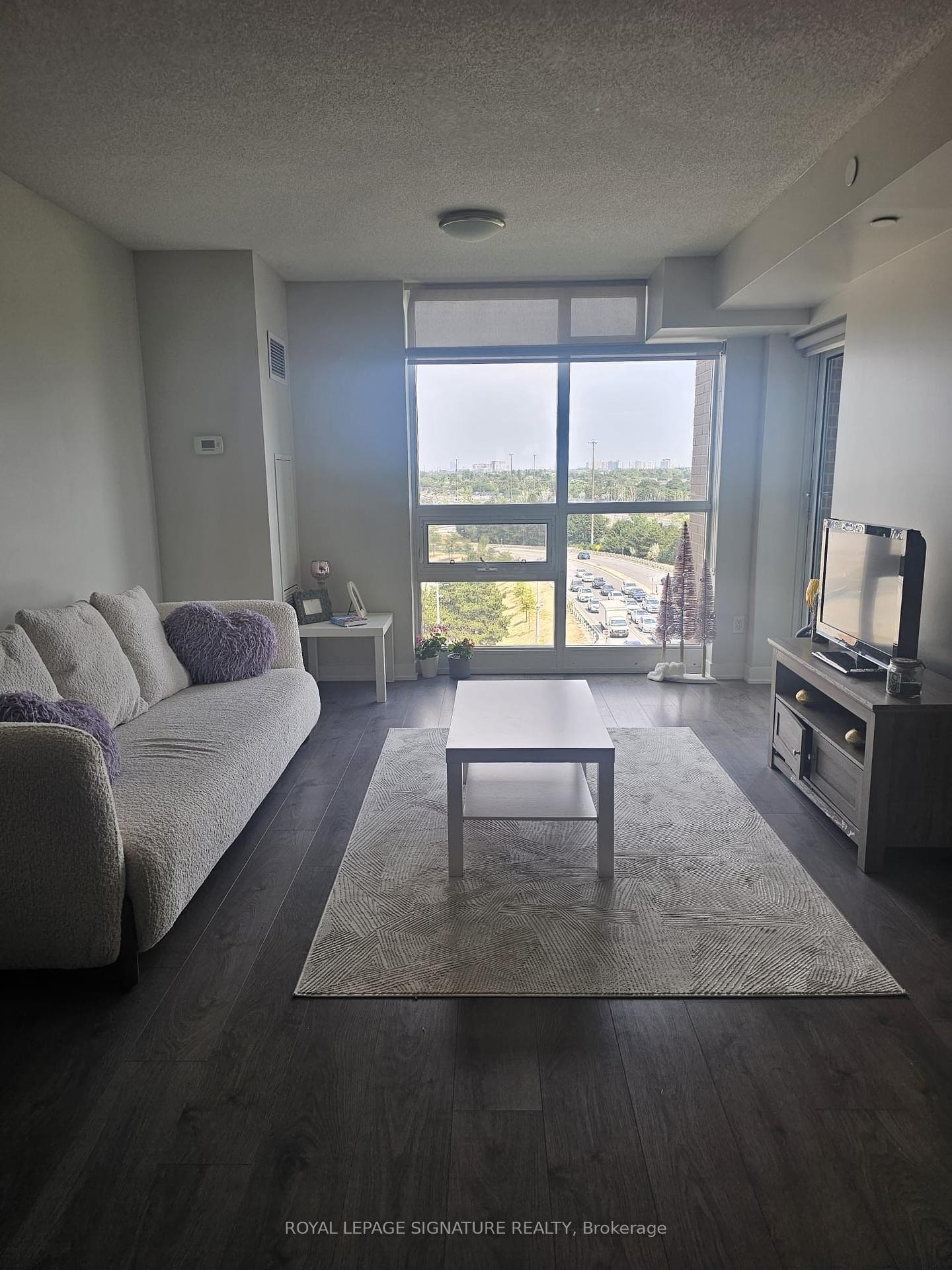 702-123 Parkway Forest Drive, Toronto, ON - Indoor Photo Showing Living Room