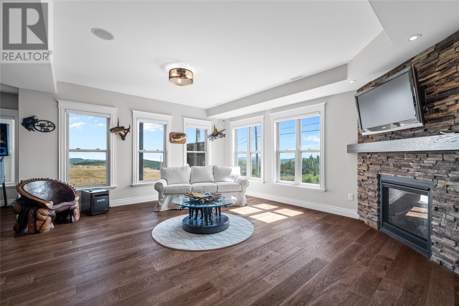 2 Scenic View Drive, Torbay, NL - Indoor Photo Showing Living Room With Fireplace