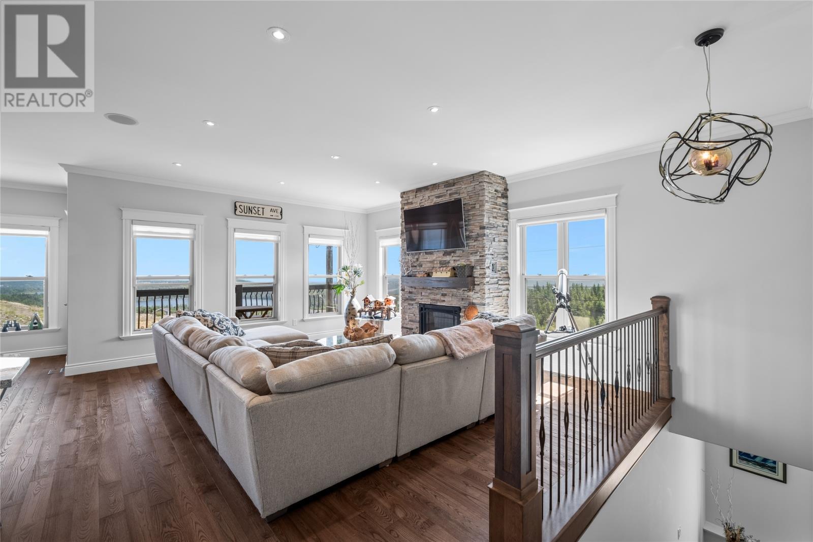 2 Scenic View Drive, Torbay, NL - Indoor Photo Showing Living Room With Fireplace