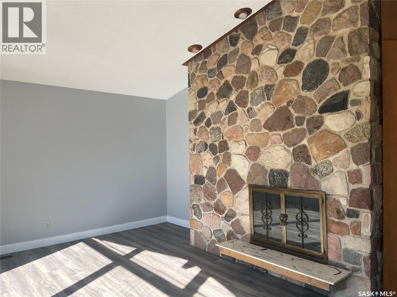 133 Halifax Street N, Regina, SK - Indoor With Fireplace