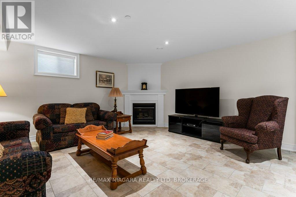34 Blossom Common, St. Catharines (Port Weller), ON - Indoor Photo Showing Living Room With Fireplace
