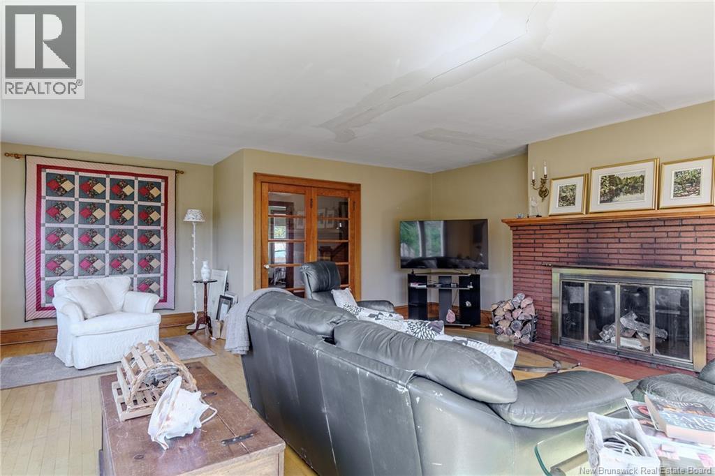 639 Main Street, Beaver Harbour, NB - Indoor Photo Showing Living Room With Fireplace