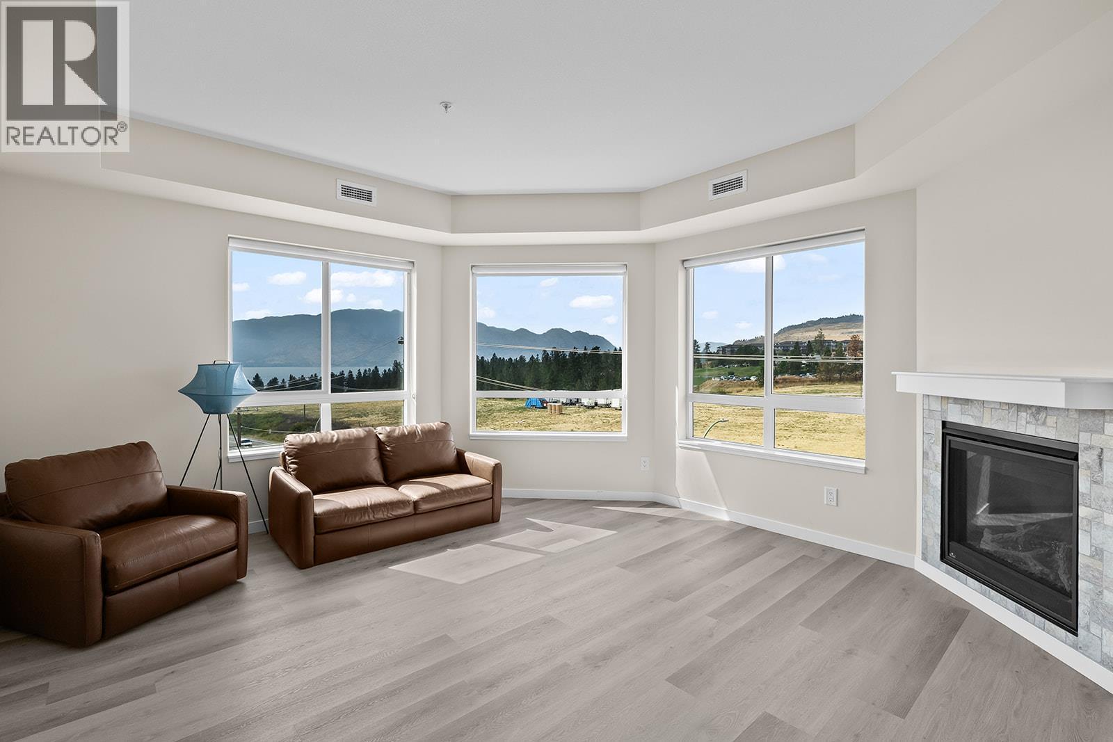 2301 Carrington Road Unit# 219, West Kelowna, BC - Indoor Photo Showing Living Room With Fireplace