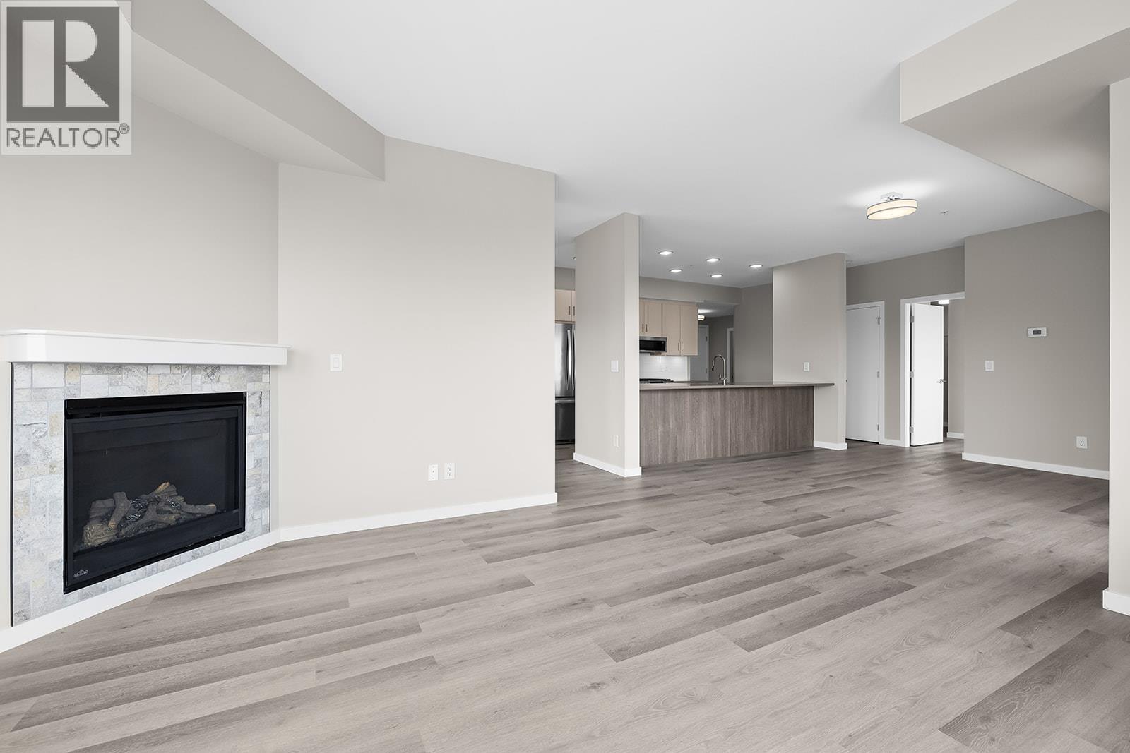 2301 Carrington Road Unit# 219, West Kelowna, BC - Indoor Photo Showing Living Room With Fireplace