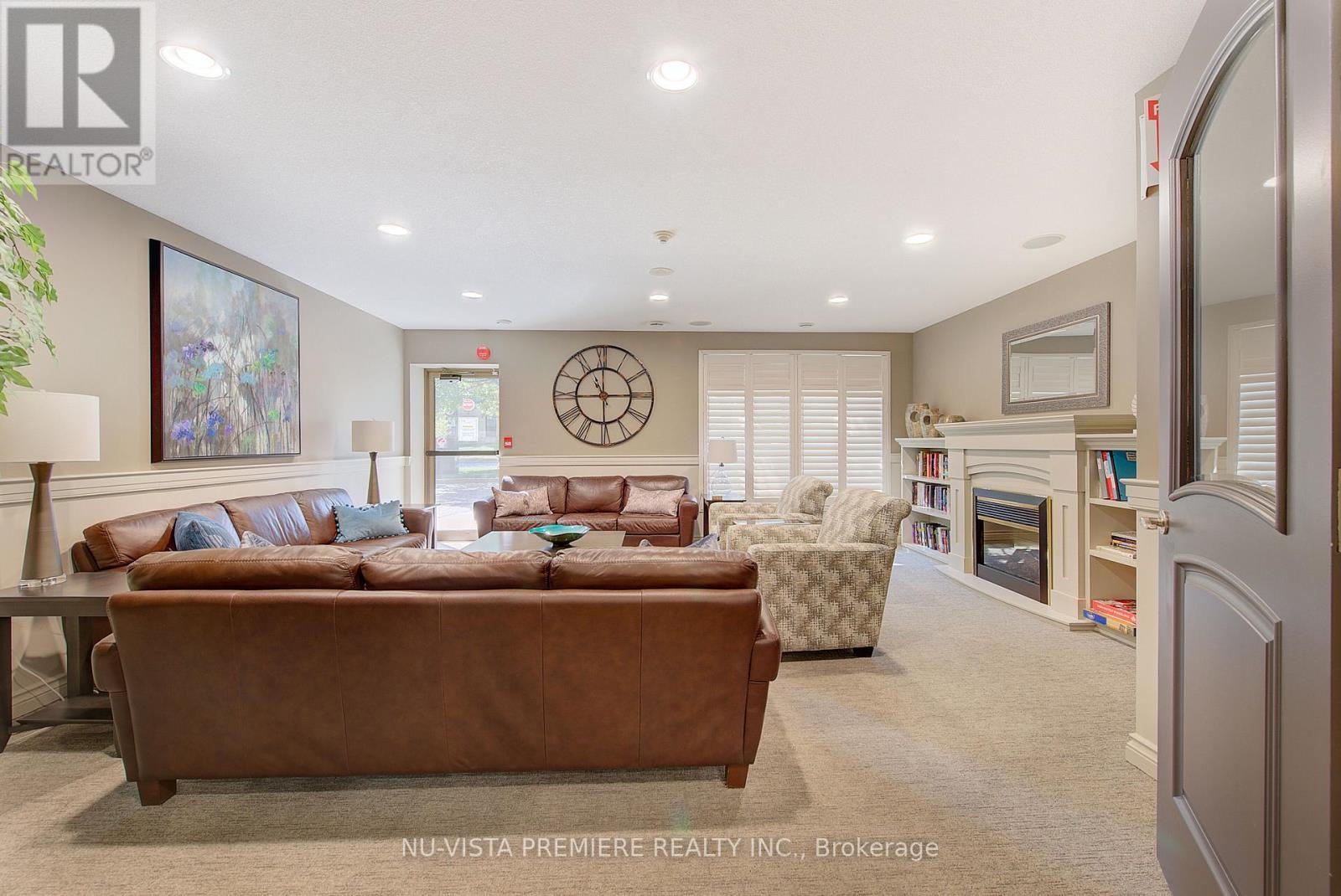 1203 - 250 Pall Mall Street, London East (East F), ON - Indoor Photo Showing Living Room With Fireplace