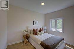 Primary Bedroom Q bed (pic from staged unit 4) -