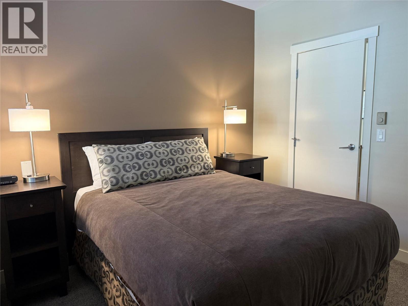 Secondary Bedroom - 2049 Summit Drive Unit# 115D, Panorama, BC - Indoor Photo Showing Bedroom