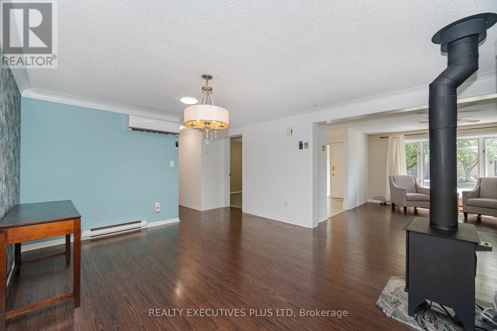 112 Tecumseth Pines Drive, New Tecumseth, ON - Indoor Photo Showing Other Room With Fireplace