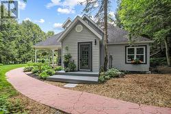 beautiful perennial gardens surround the home -