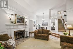 living room with cozy wood burning fireplace -