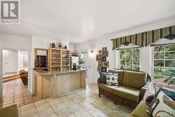 sun room with fully equipped wet bar -