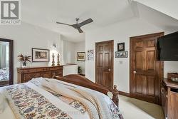 primary bedroom with separate walk-in closets -