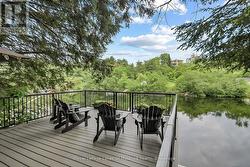 large sun deck overlooking the Muskoka River -