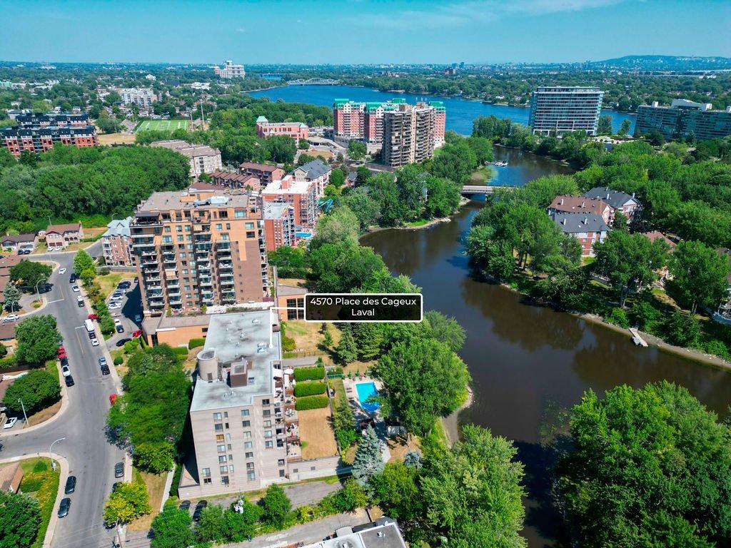 Photo aérienne - 101-4570 Ch. Des Cageux, Laval (Chomedey), QC - Outdoor With Body Of Water With View