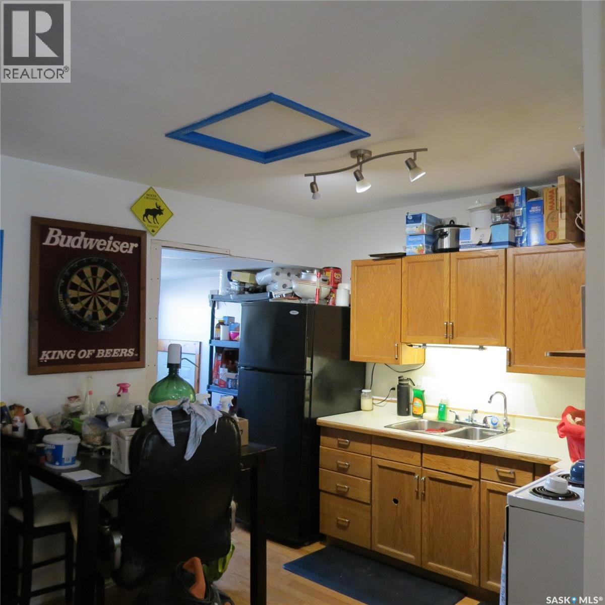 2256 Wascana Street, Regina, SK - Indoor Photo Showing Kitchen With Double Sink