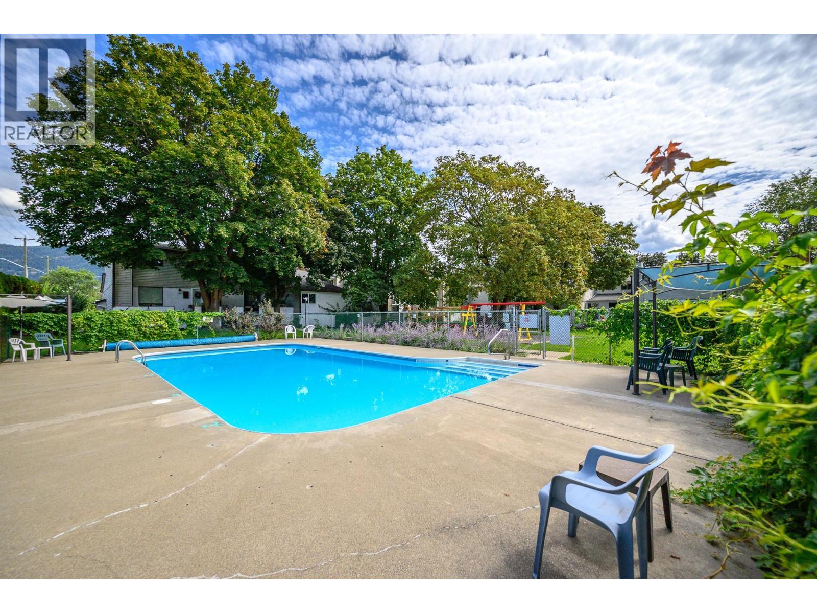 2100 43 Avenue Unit# 205, Vernon, BC - Outdoor With In Ground Pool
