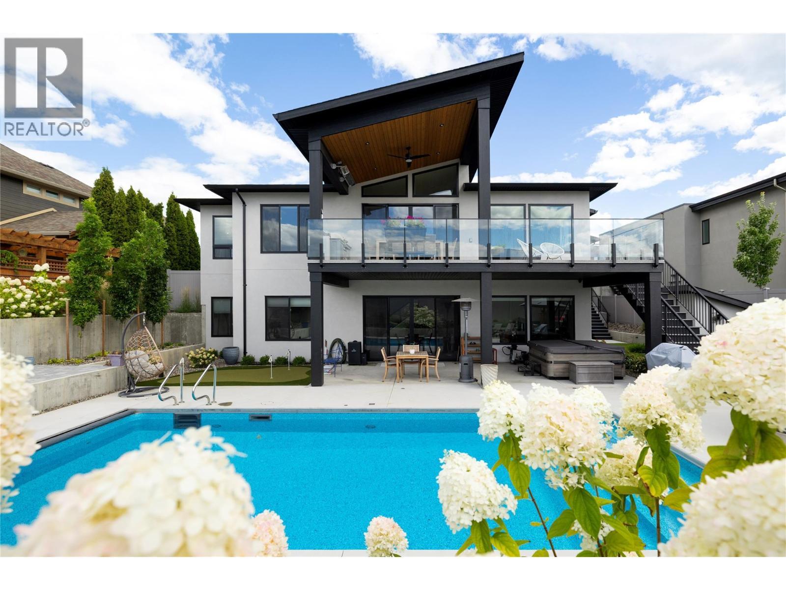 640 Mt. Ida Crescent, Coldstream, BC - Outdoor With In Ground Pool With Deck Patio Veranda