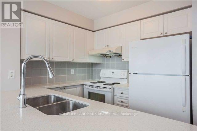 1404 - 50 Brian Harrison Way, Toronto, ON - Indoor Photo Showing Kitchen With Double Sink