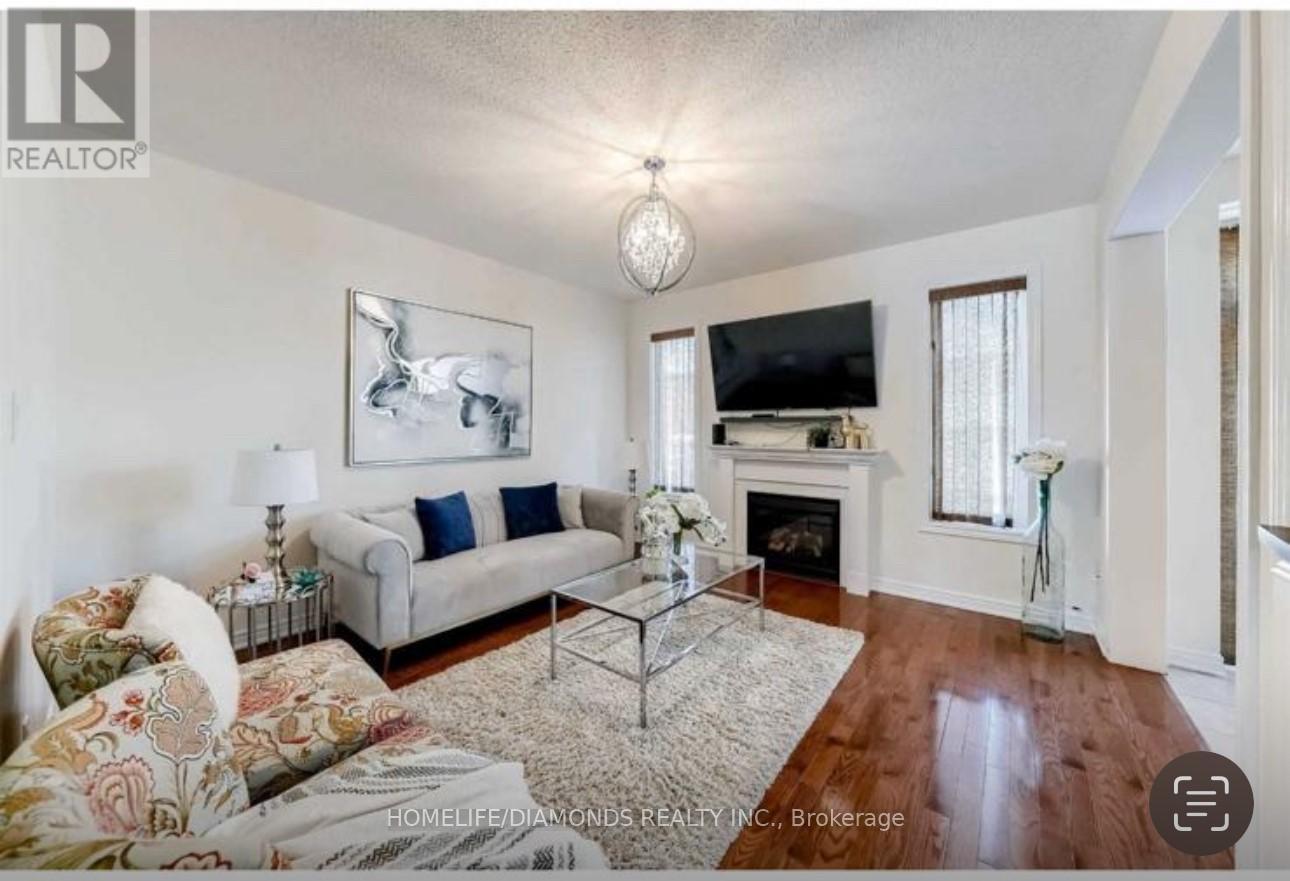 35 Fishing Crescent, Brampton, ON - Indoor Photo Showing Living Room With Fireplace
