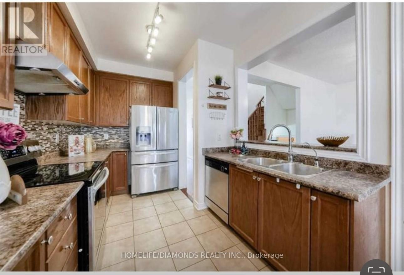 35 Fishing Crescent, Brampton, ON - Indoor Photo Showing Kitchen With Double Sink