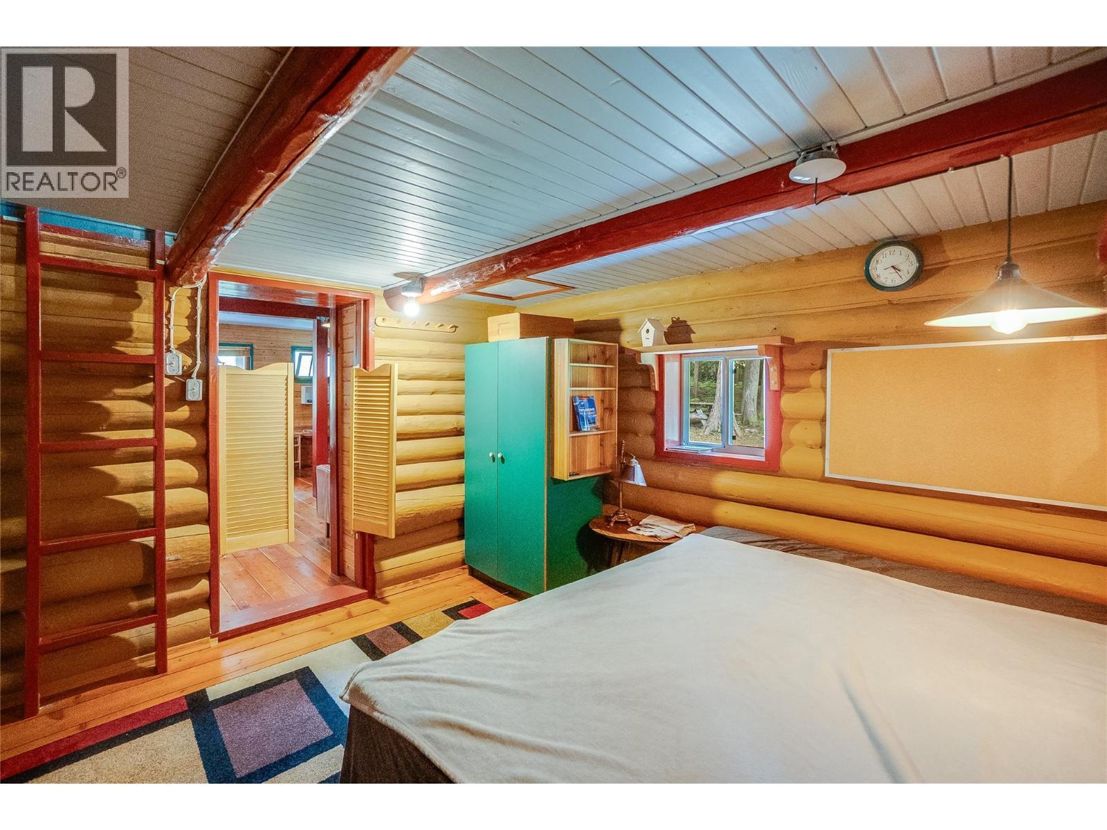 8780 Martens Road, Slocan, BC - Indoor Photo Showing Bedroom