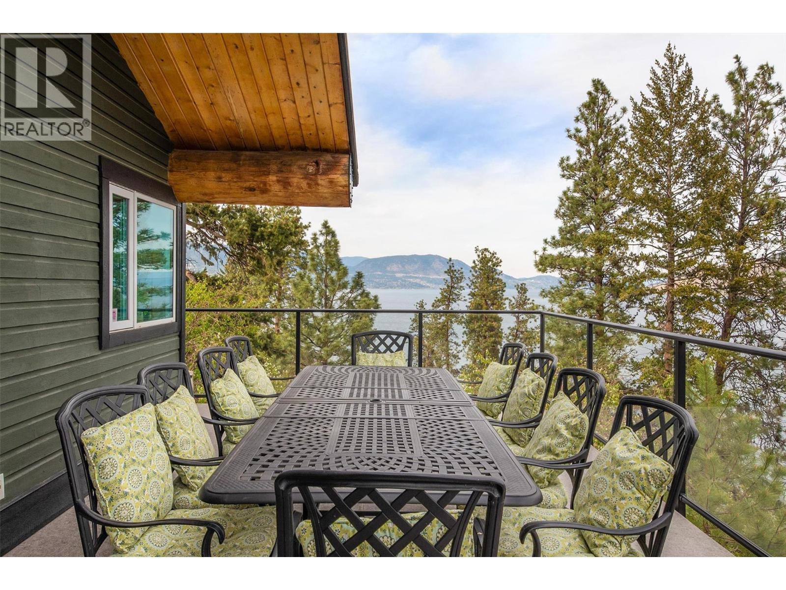 Spacious outdoor dining area off the kitchen and great room! - 7172 Brent Road, Peachland, BC - Outdoor With Exterior