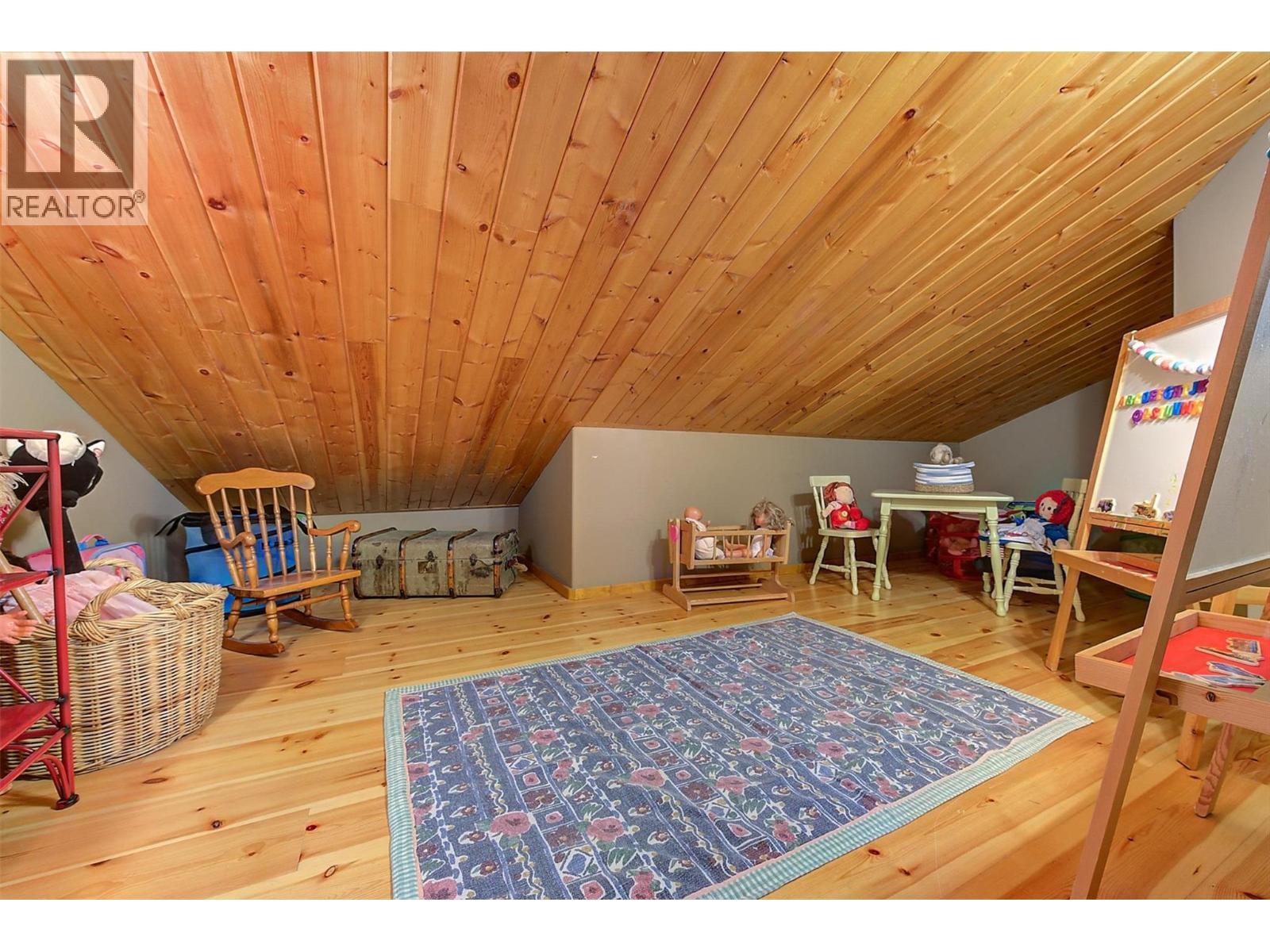 Perfect space for your play room! - 7172 Brent Road, Peachland, BC - With Deck Patio Veranda With Exterior