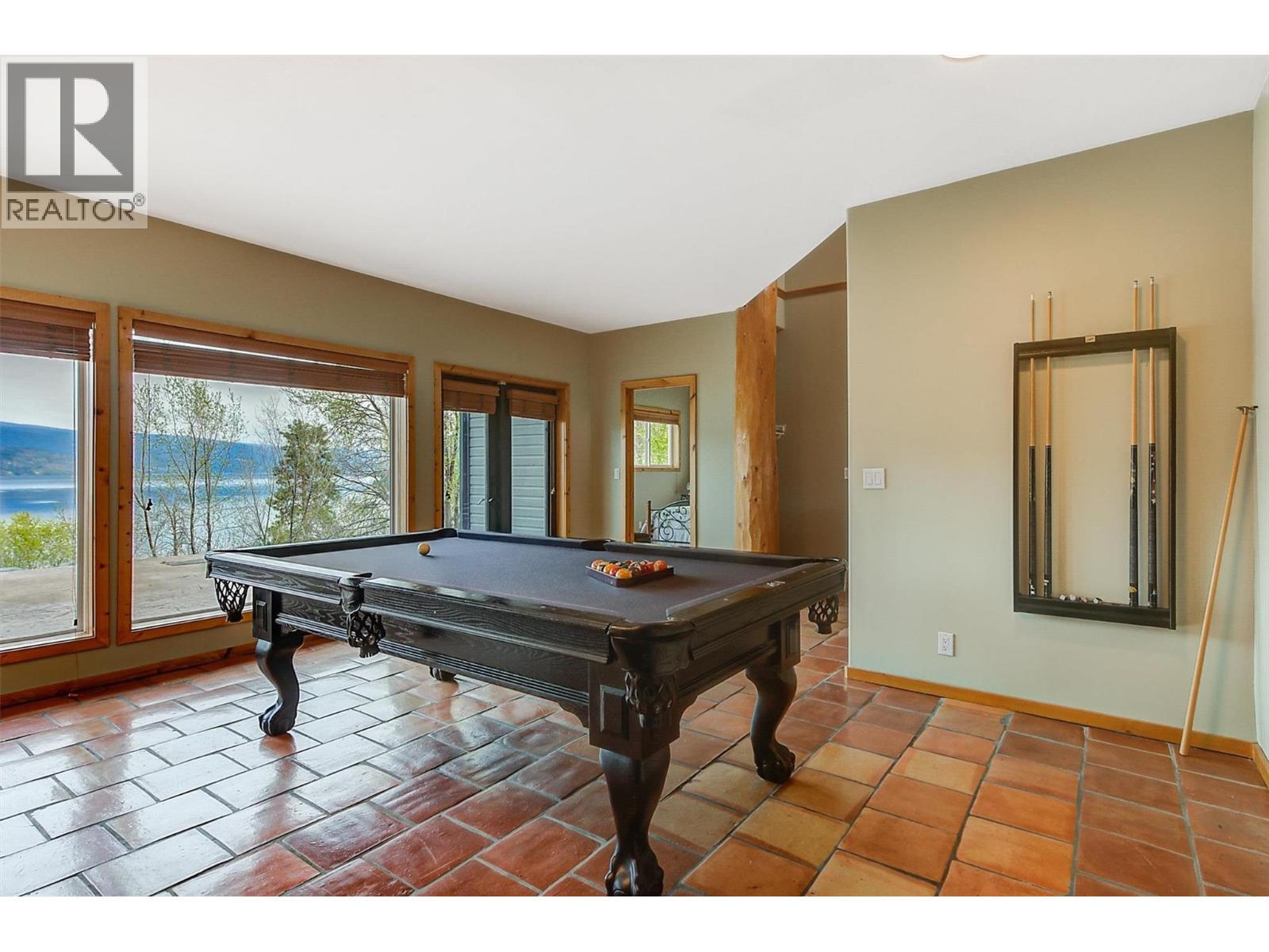 Rec area on lower level - 7172 Brent Road, Peachland, BC - Indoor Photo Showing Other Room